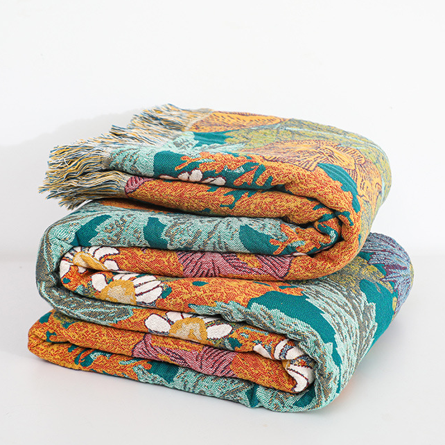 Trapunta reversibile in garza di cotone con fiori da giardino