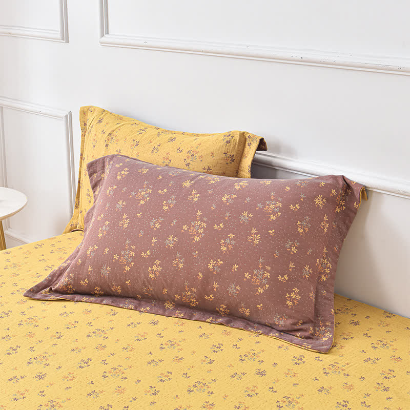 Comodo copriletto in garza di cotone jacquard tinto in filo