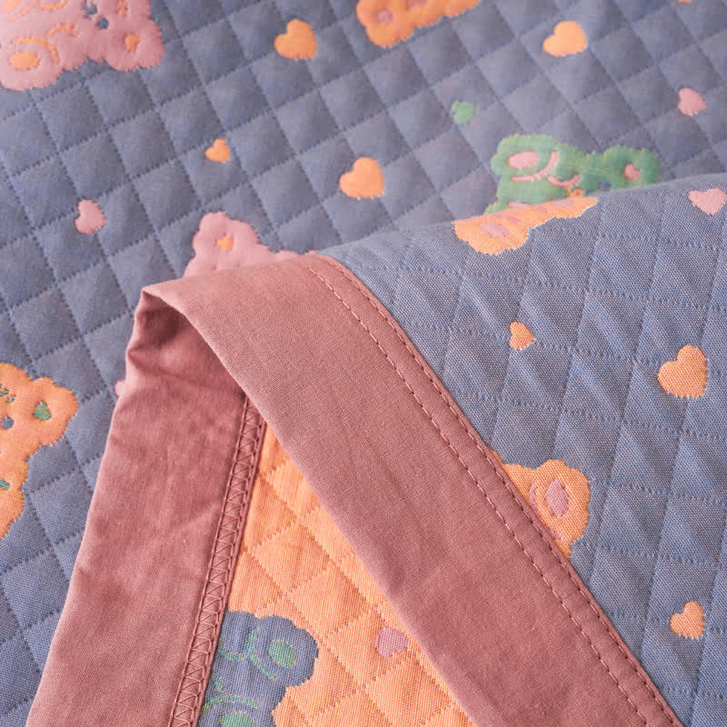 Trapunta reversibile in garza di cotone Jacquard Bear