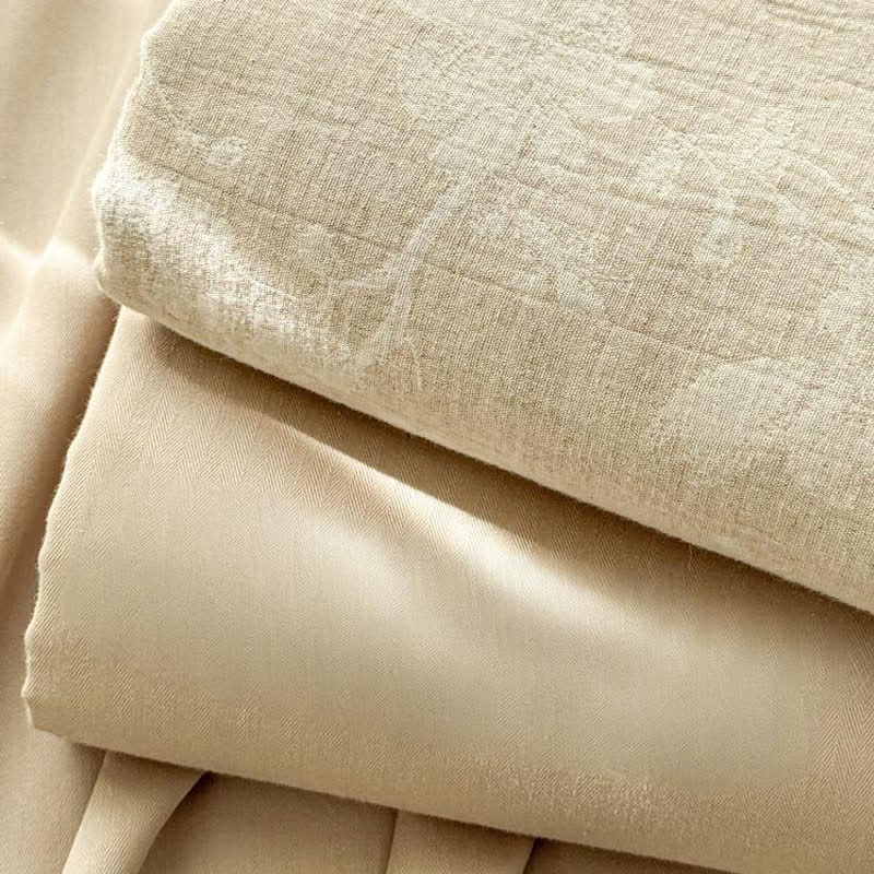 Copriletto in lino e cotone testurizzato con motivo floreale beige