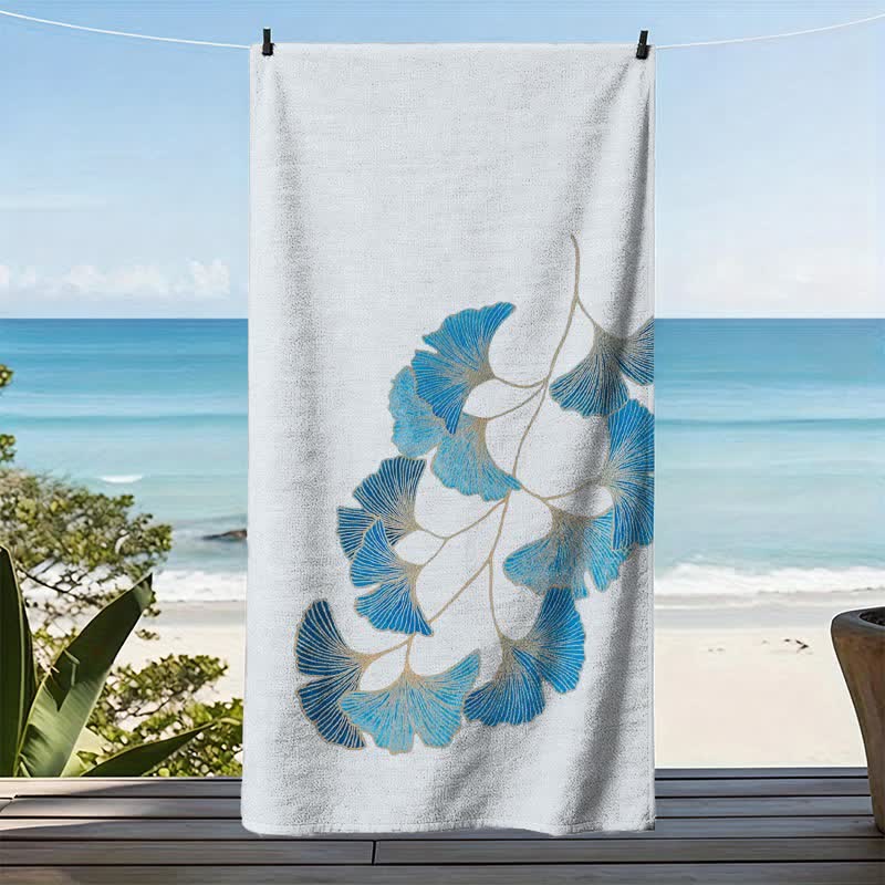 Elegante telo mare con foglie di ginkgo blu. - image 3
