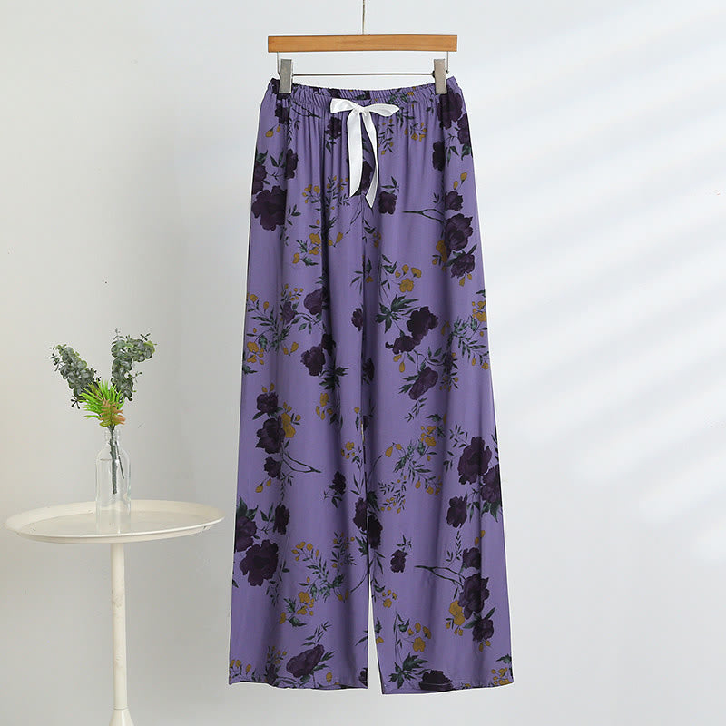 Pigiama con canotta e pantaloni a fantasia floreale viola - image 5