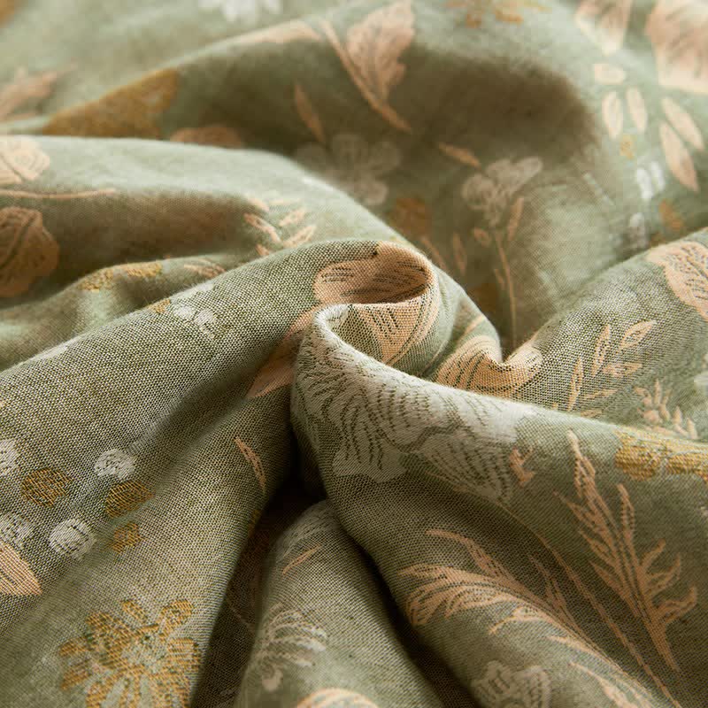 Trapunta jacquard con motivo floreale a foglie in garza di cotone - image 10