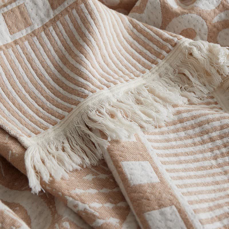 Coperta tribale in garza di cotone con nappe e motivi geometrici - image 7