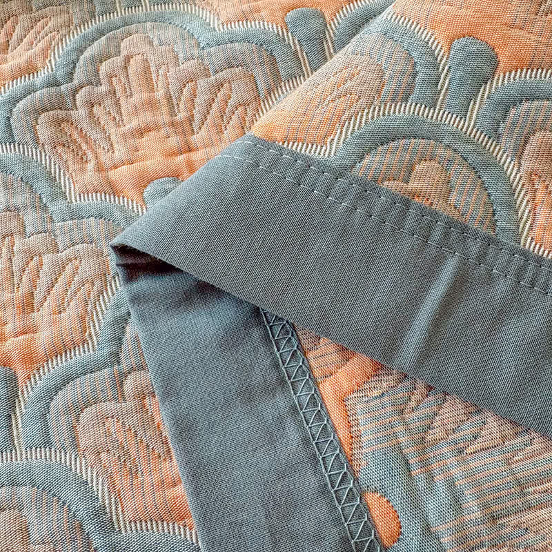 Trapunta a 3 strati in mussola di cotone jacquard con motivo a conchiglie marine - image 11