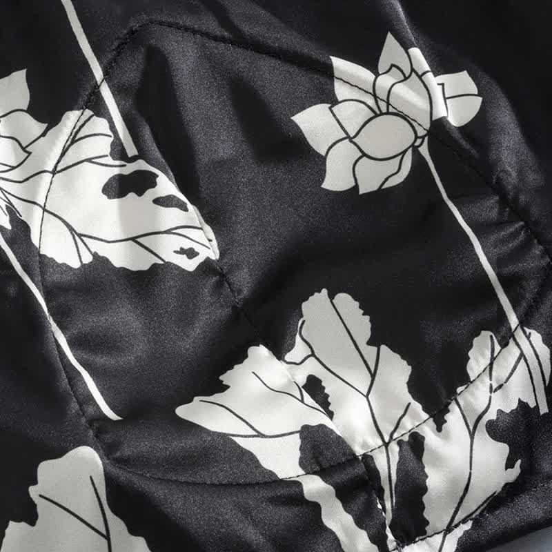 Completo pigiama nero con canotta e pantaloncini a fantasia floreale - image 12