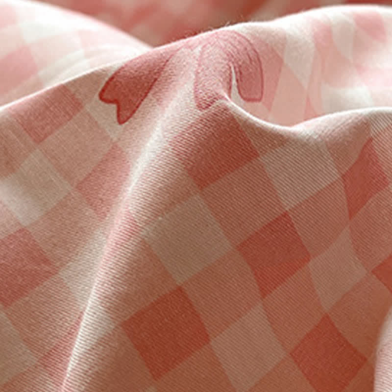 Set di biancheria da letto in morbido cotone lavato con motivo a fiocchi e quadri. - image 8
