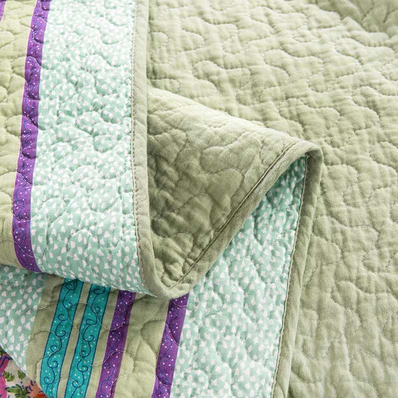 Trapunta floreale patchwork boho con federe