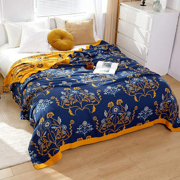 Trapunta reversibile in garza di cotone con fiori di garofano