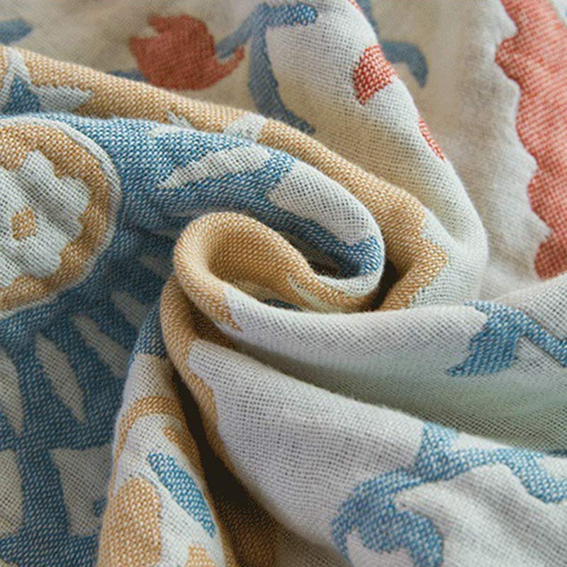 Trapunta reversibile in cotone con stampa floreale colorata