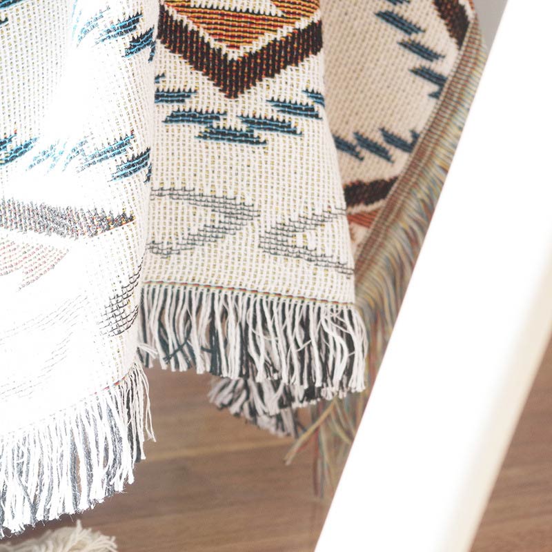 Coperta da salotto in maglia bohémien con nappa