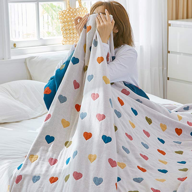 Trapunta reversibile in garza di cotone con cuori colorati