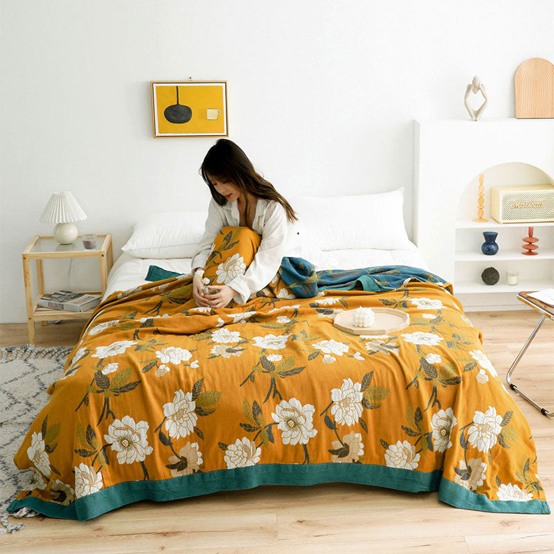 Trapunta reversibile in cotone con fiori gialli Boho di Ownkoti