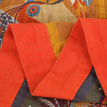 Trapunta reversibile in cotone morbido con motivo tucano