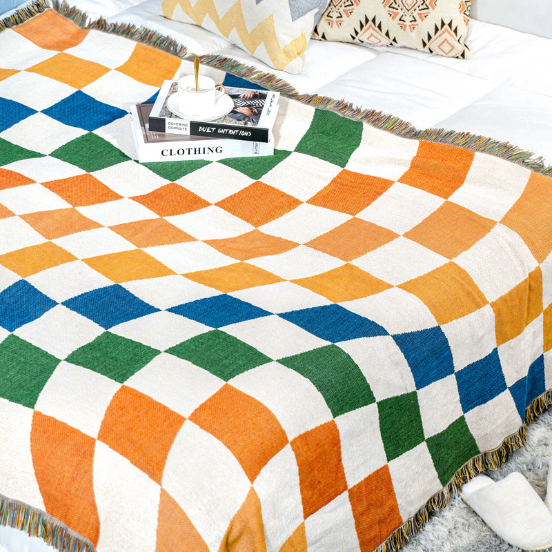 Coperta morbida con nappe a scacchiera colorata
