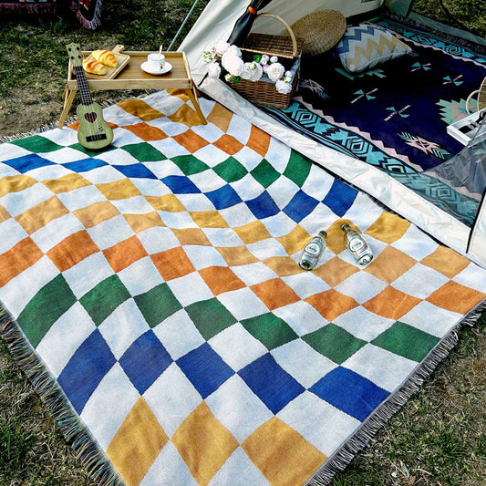 Coperta morbida con nappe a scacchiera colorata