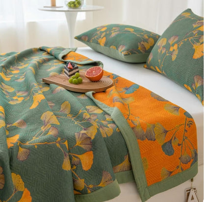 Trapunta reversibile in cotone jacquard con foglie di ginkgo