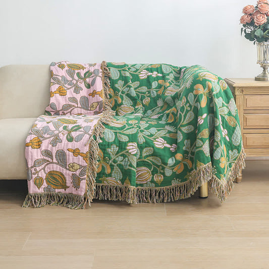 Coperta reversibile in garza di cotone con nappe floreali