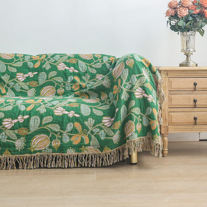 Coperta reversibile in garza di cotone con nappe floreali