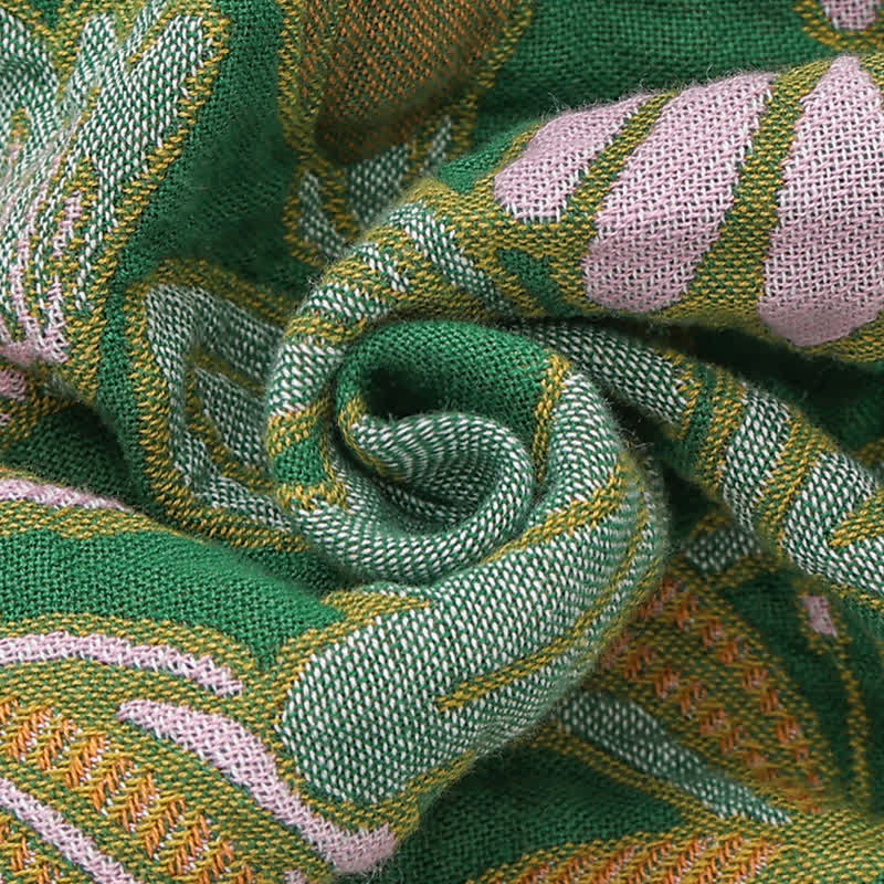 Coperta reversibile in garza di cotone con nappe floreali