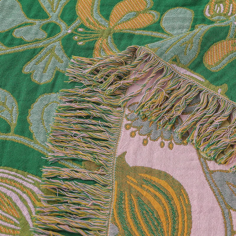 Coperta reversibile in garza di cotone con nappe floreali