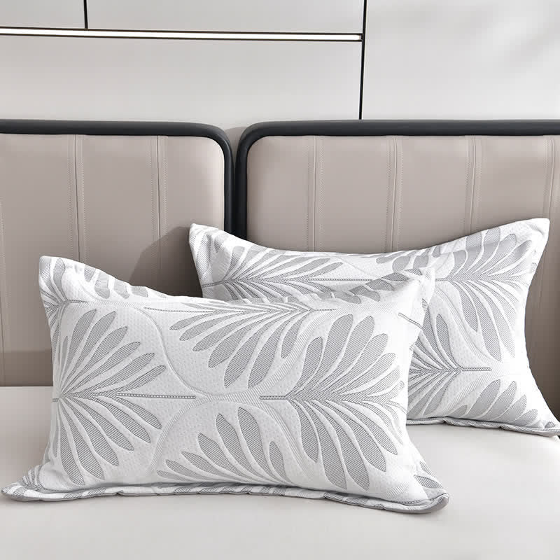 Trapunta traspirante con foglie in jacquard