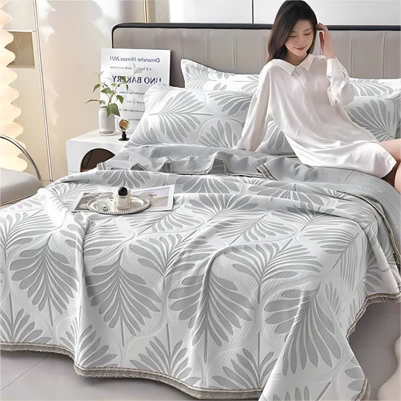 Trapunta traspirante con foglie in jacquard