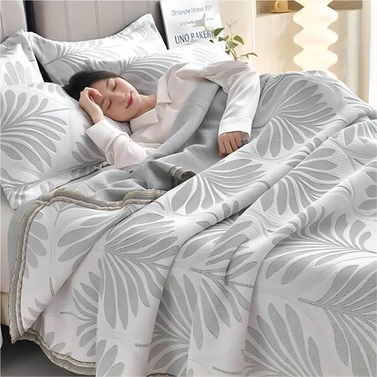 Trapunta traspirante con foglie in jacquard