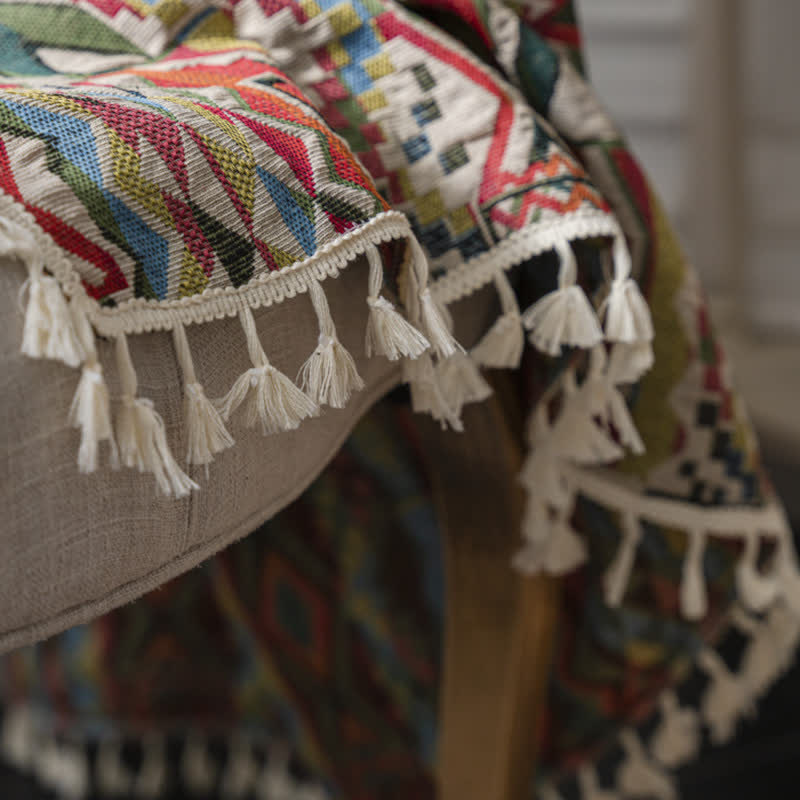 Tenda semi-ombreggiante con nappe geometriche colorate
