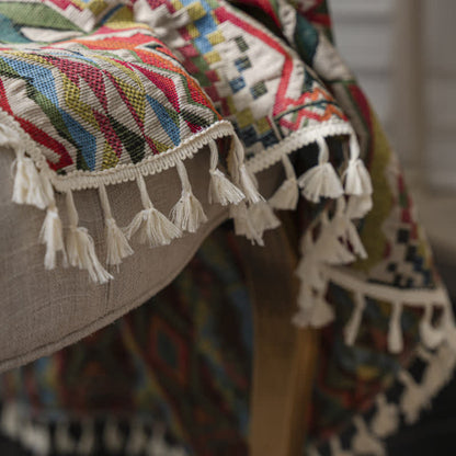 Tenda semi-ombreggiante con nappe geometriche colorate
