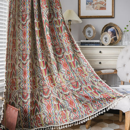 Tenda semi-ombreggiante con nappe geometriche colorate