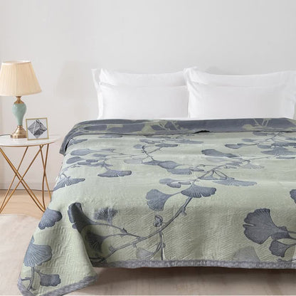 Trapunta reversibile in garza di cotone con foglie di ginkgo
