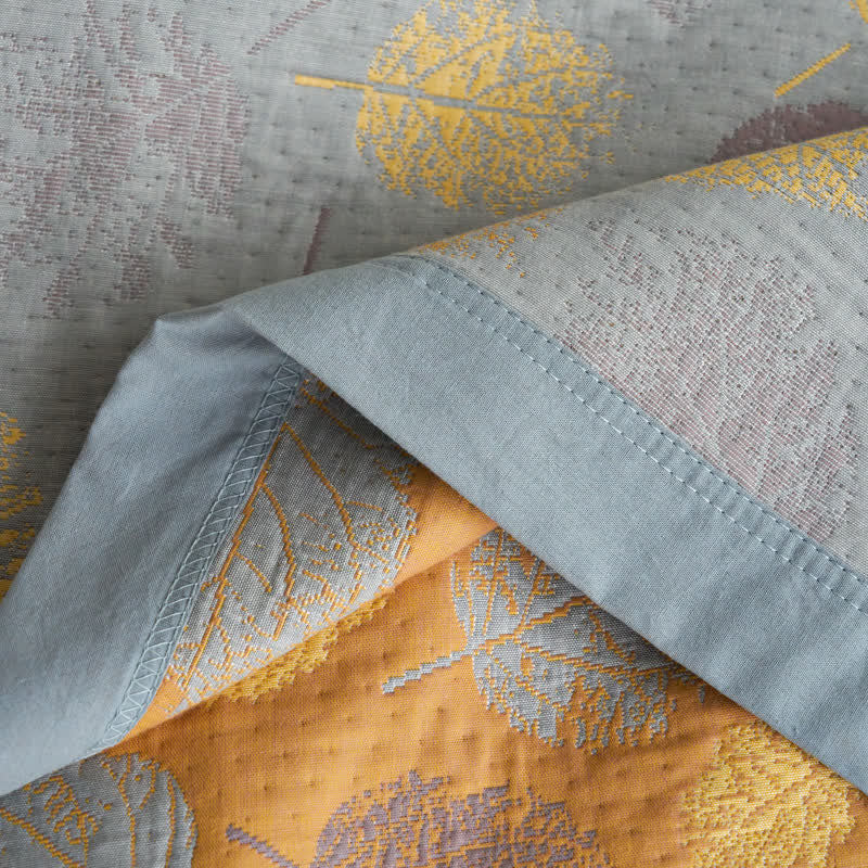 Trapunta reversibile a foglia in garza di cotone jacquard