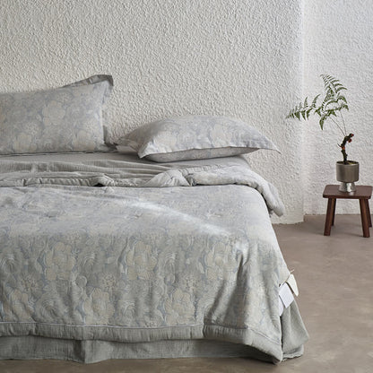 Collezione di biancheria da letto in garza di cotone floreale neutra