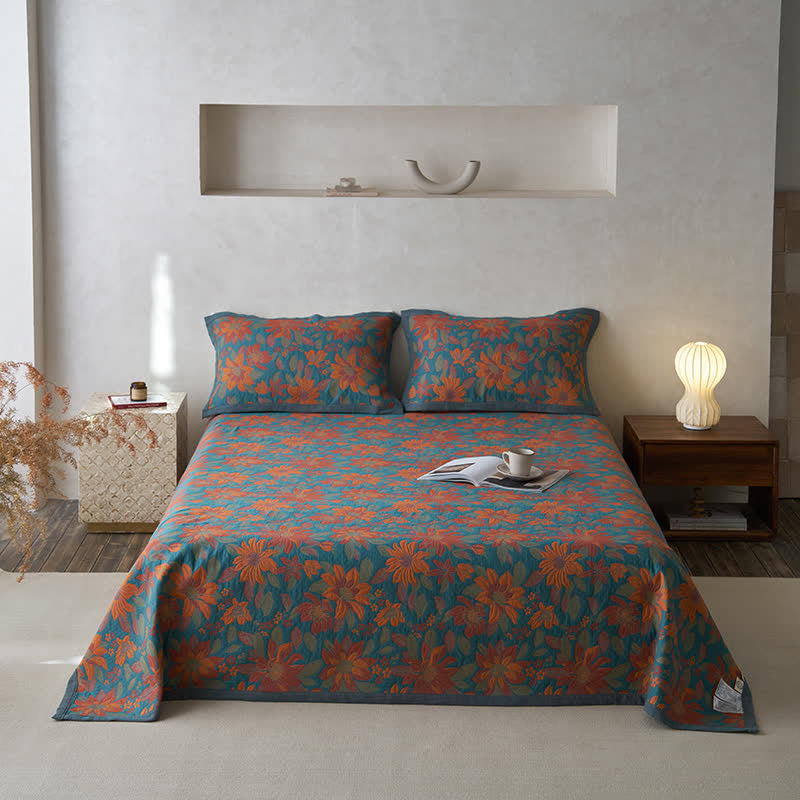 Trapunta con fiori in fiore in puro cotone tinto in filo