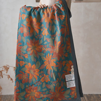 Trapunta con fiori in fiore in puro cotone tinto in filo