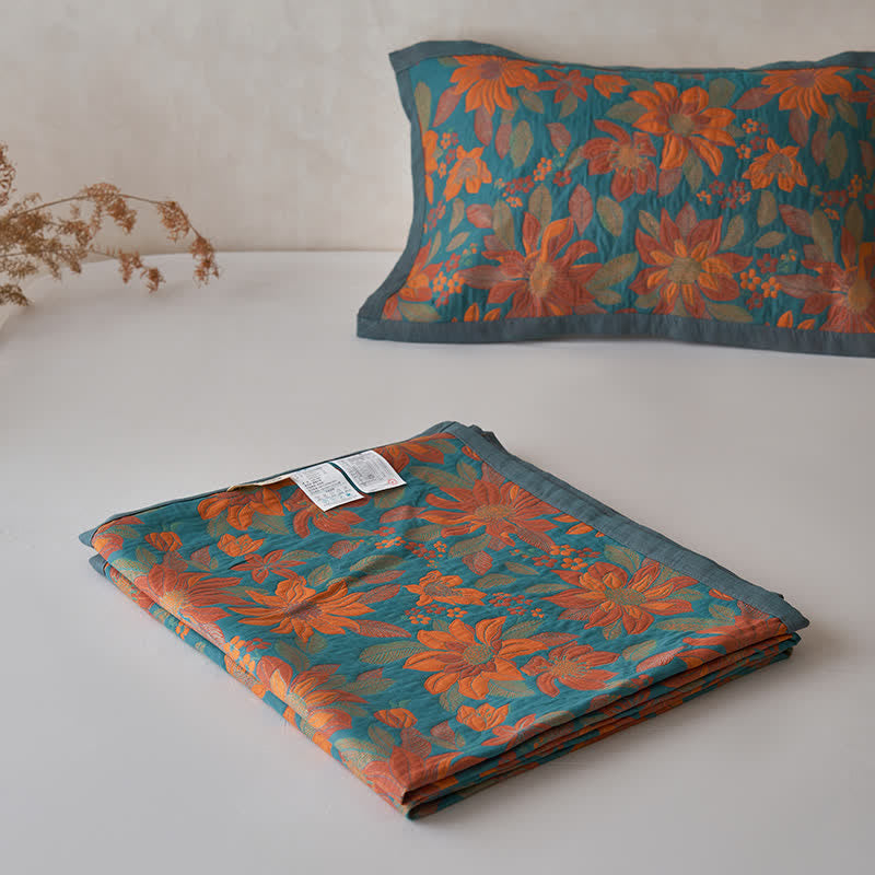 Trapunta con fiori in fiore in puro cotone tinto in filo