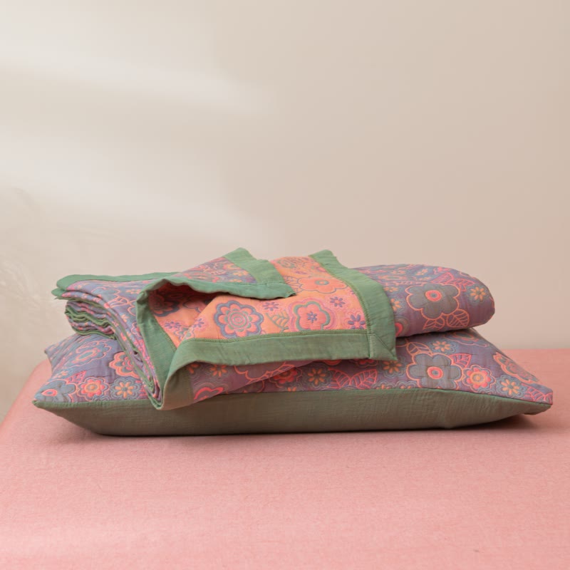 Trapunta reversibile in garza di cotone jacquard a fiori
