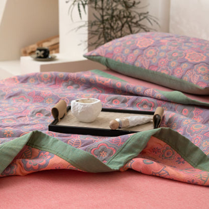 Trapunta reversibile in garza di cotone jacquard a fiori