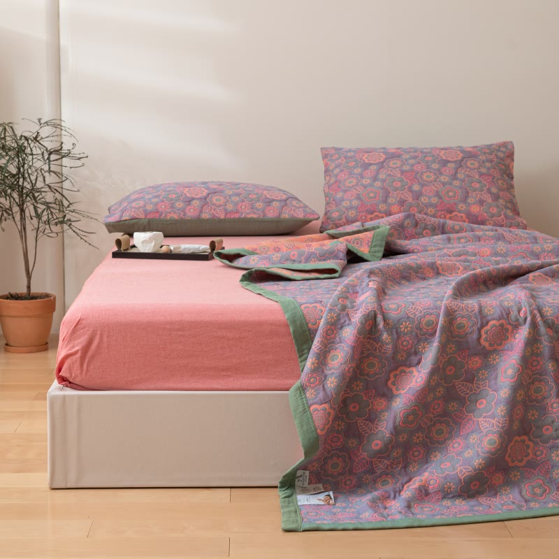 Trapunta reversibile in garza di cotone jacquard a fiori