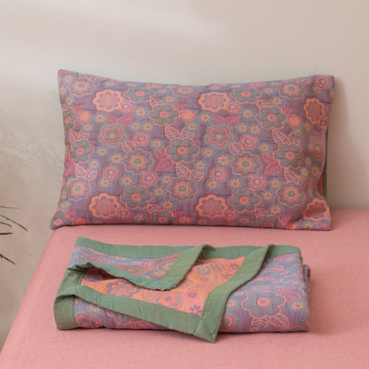 Trapunta reversibile in garza di cotone jacquard a fiori