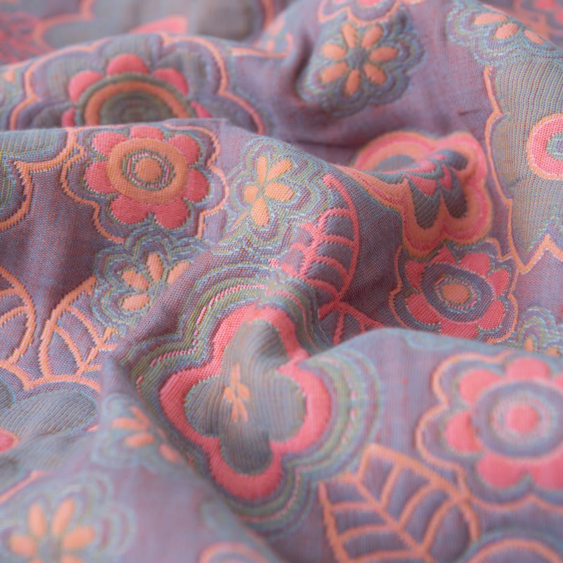 Trapunta reversibile in garza di cotone jacquard a fiori