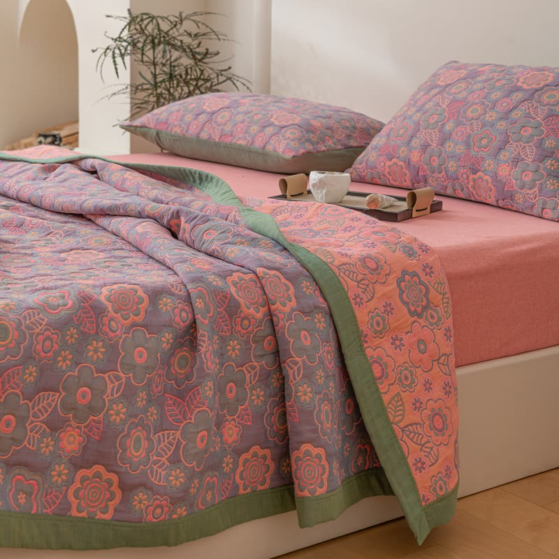 Trapunta reversibile in garza di cotone jacquard a fiori