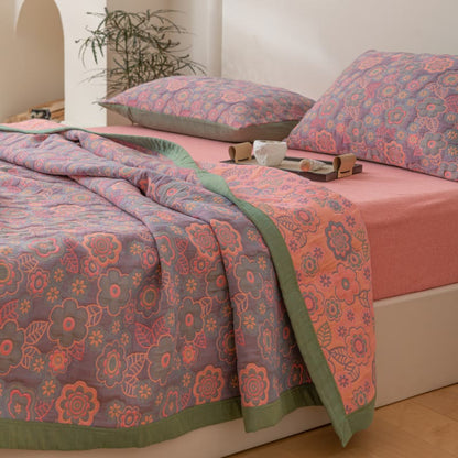 Trapunta reversibile in garza di cotone jacquard a fiori