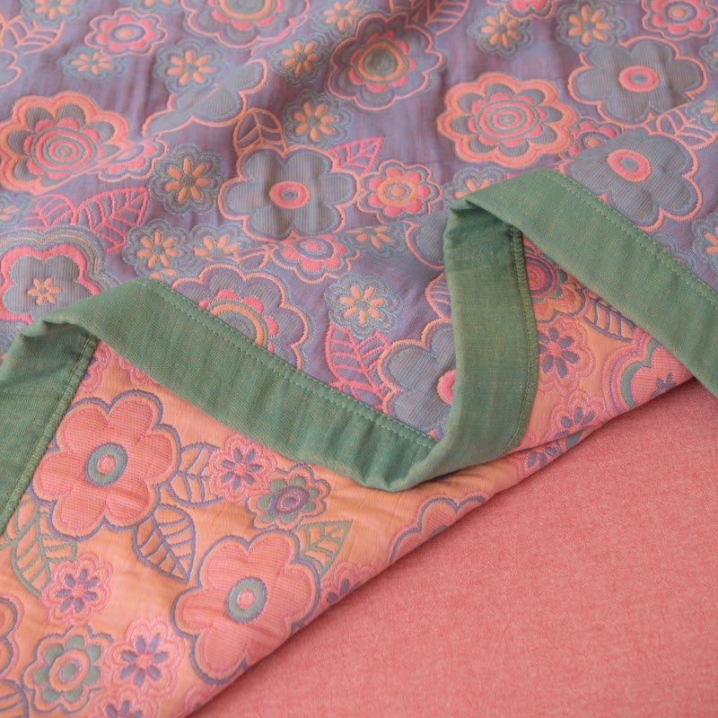 Trapunta reversibile in garza di cotone jacquard a fiori