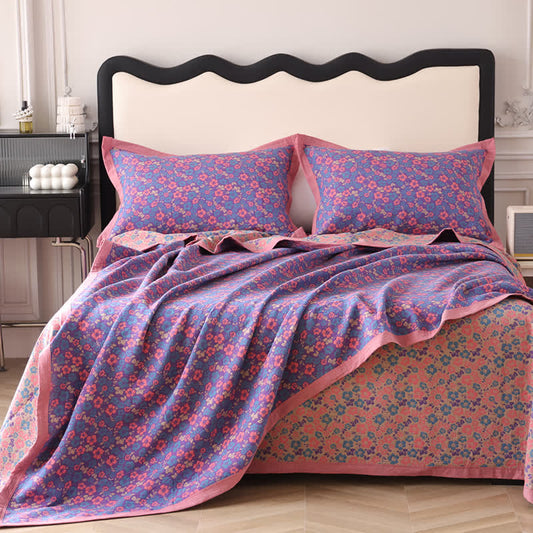 Trapunta reversibile in garza di cotone jacquard floreale