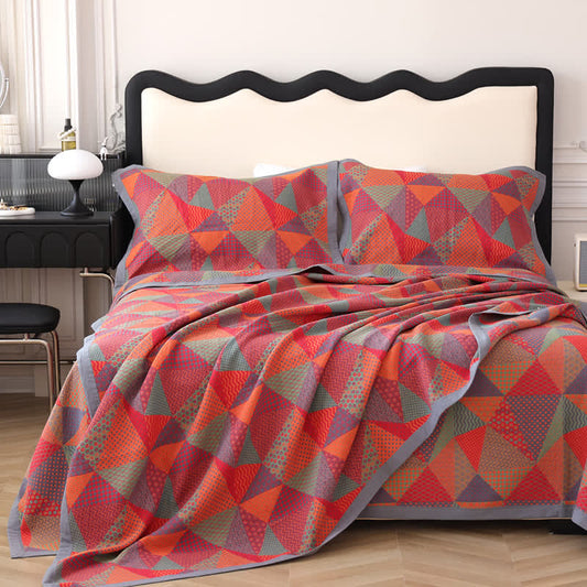 Trapunta reversibile in cotone biologico triangolare Jacquard