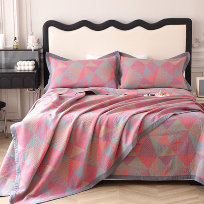 Trapunta reversibile in cotone biologico triangolare Jacquard