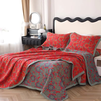 Trapunta reversibile in puro cotone con motivo floreale elegante