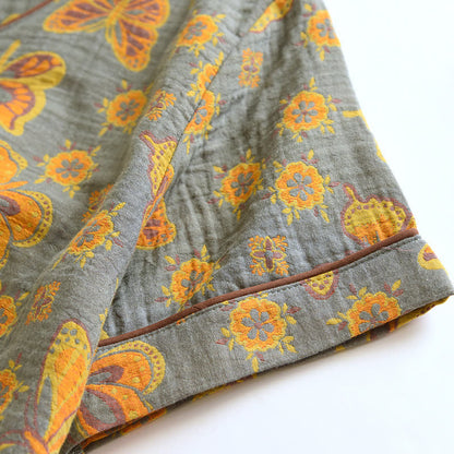 Completo da casa con pantaloni corti in cotone a farfalla